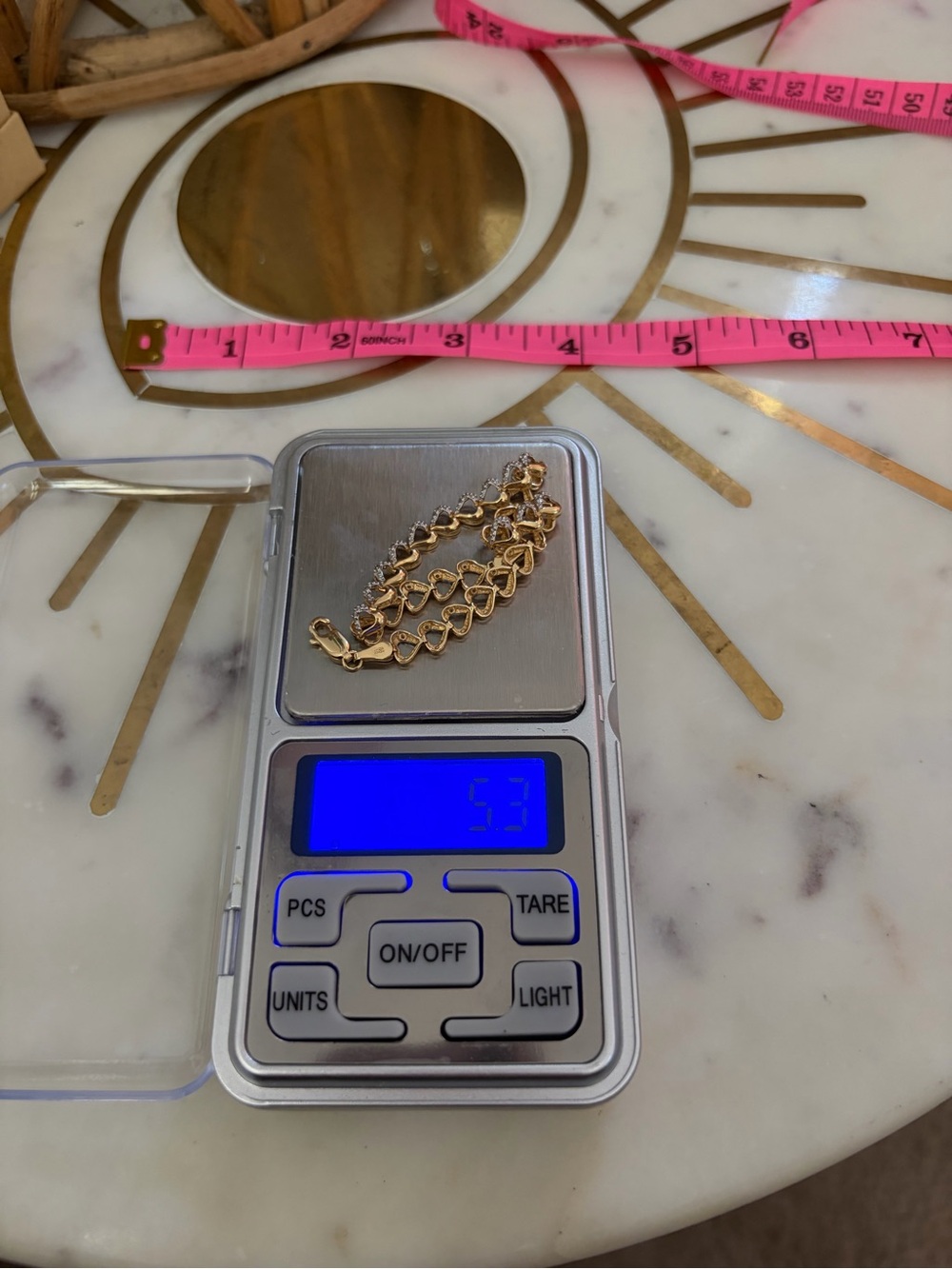 14k gold heart bracelet with sapphire